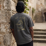 Guy in Pike Fraternity Knight Tee in castle