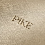 Soft beige fabric close-up showing a smooth, heavyweight knit texture with gentle folds and subtle draping.