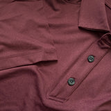 Close-up texture image of Maroon Cutter & Buck Polo