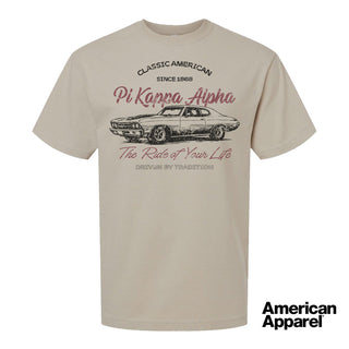 Beige T-shirt displayed on a plain background with a vintage-inspired graphic of a classic muscle car, mixed typography, and a soft red and black print design.