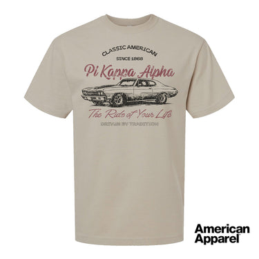 Beige T-shirt displayed on a plain background with a vintage-inspired graphic of a classic muscle car, mixed typography, and a soft red and black print design.