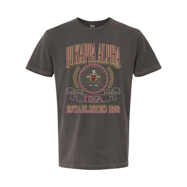 Pike Collegiate Crest Graphic Tee in charcoal grey featuring bold Pi Kappa Alpha lettering, fraternity crest, Greek letters, and established year design.
