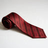 Official Pi Kappa Alpha Signature Striped Silk Tie in red with woven Pi Kappa Alpha Greek letters, premium fraternity neck tie for composite photos, formals, weddings, graduation, and professional attire.